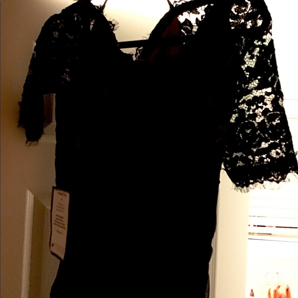 Navy gown, brand new never worn.